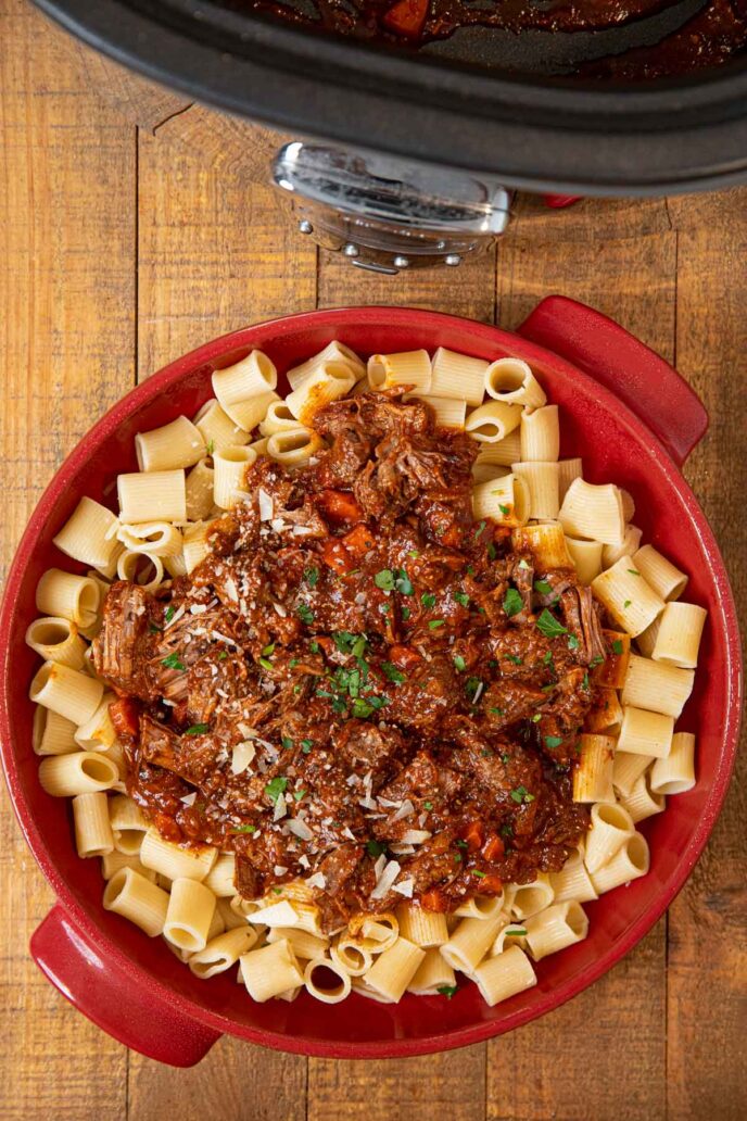 Slow Cooker Beef Ragu in Red Bowl