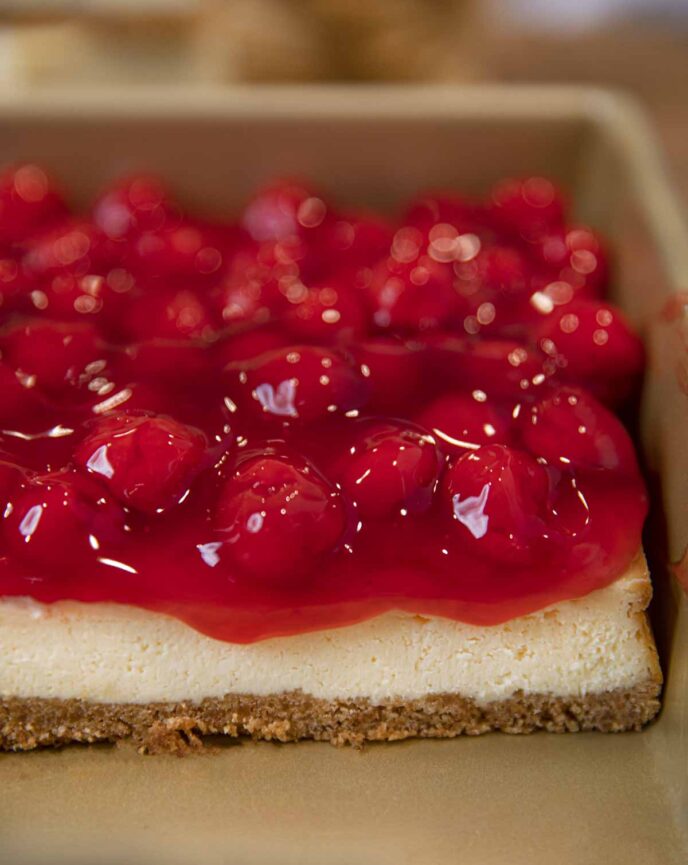 Cherry Filling over Almond Flavored Cheesecake Bars