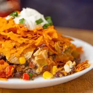 plated casserole topped with sour cream
