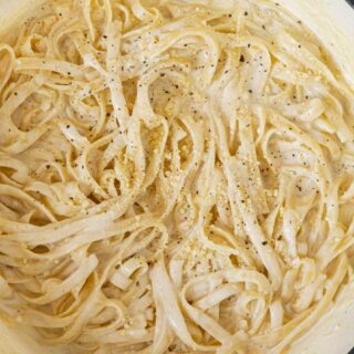 White Sauce on pasta in pot