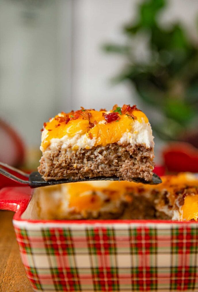 spatula taking slice of meatloaf 