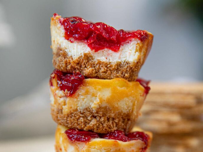 Mini Cherry Cheesecake Muffin Bites in a stack