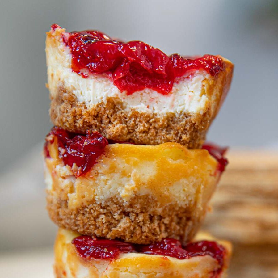 Mini Cherry Cheesecake Muffin Bites in a stack