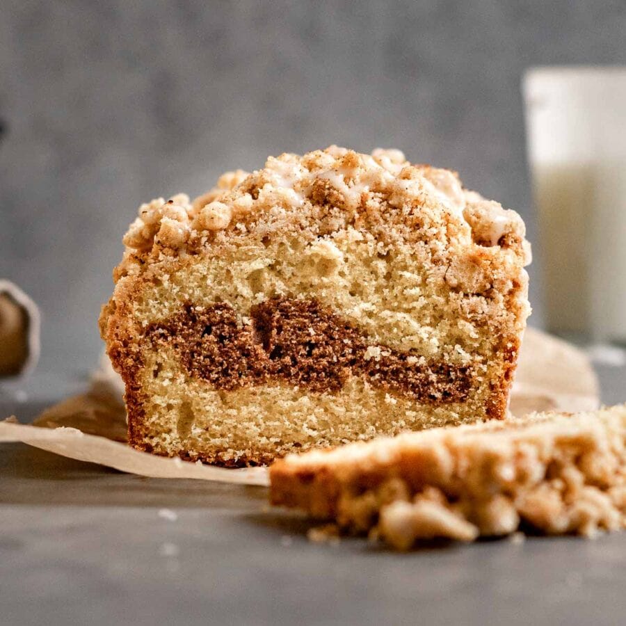 New York Crumb Loaf Cake sliced on parchment
