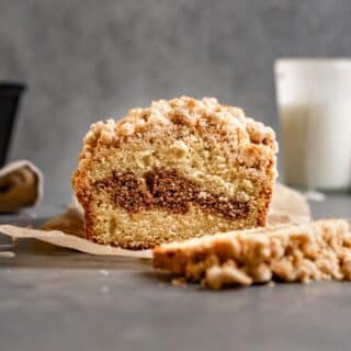 New York Crumb Loaf Cake sliced on parchment