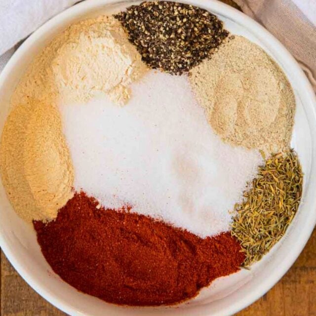 unmixed spices in a white bowl