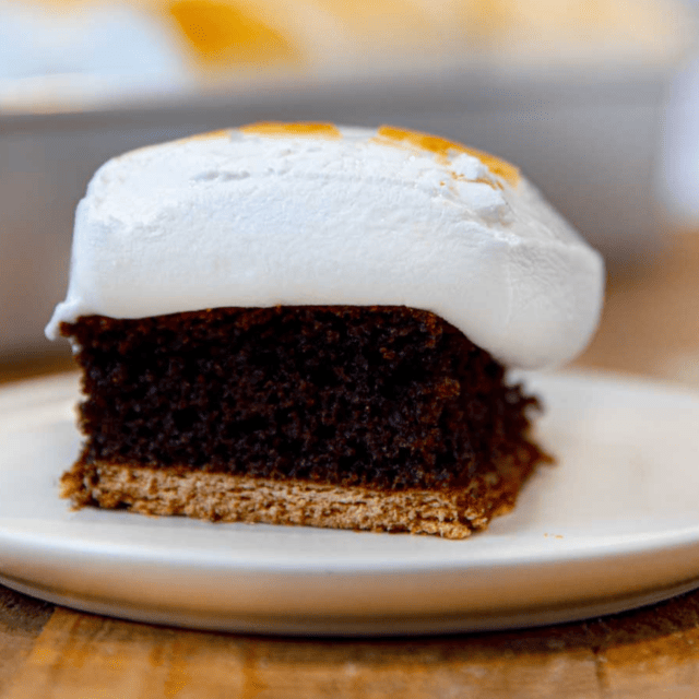 piece of cake on a plate with marshmallow on top
