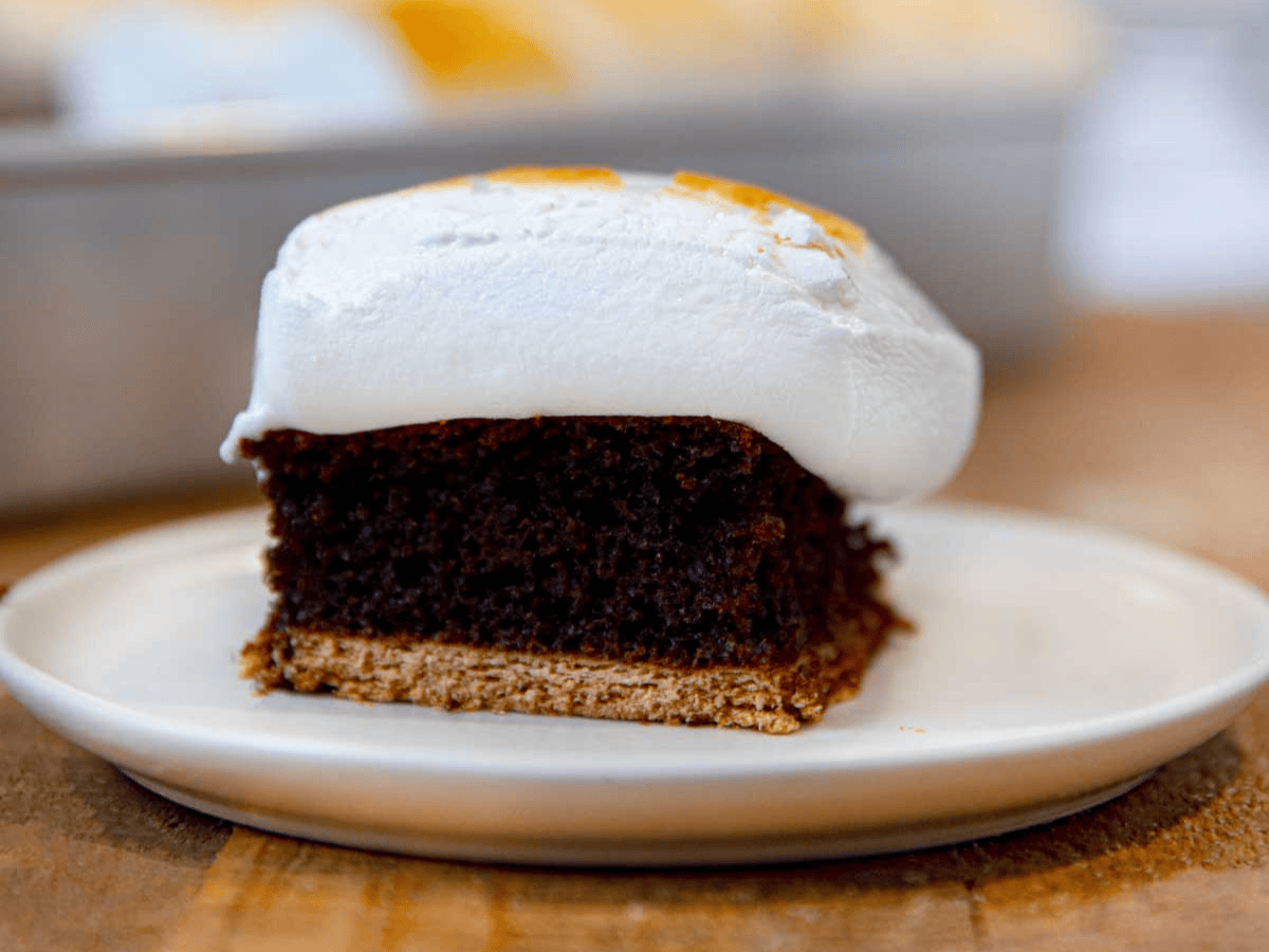 piece of cake on a plate with marshmallow on top