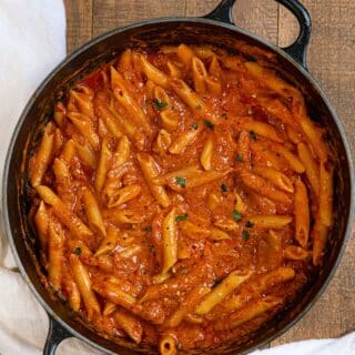 Cooked pasta in sauce in pan