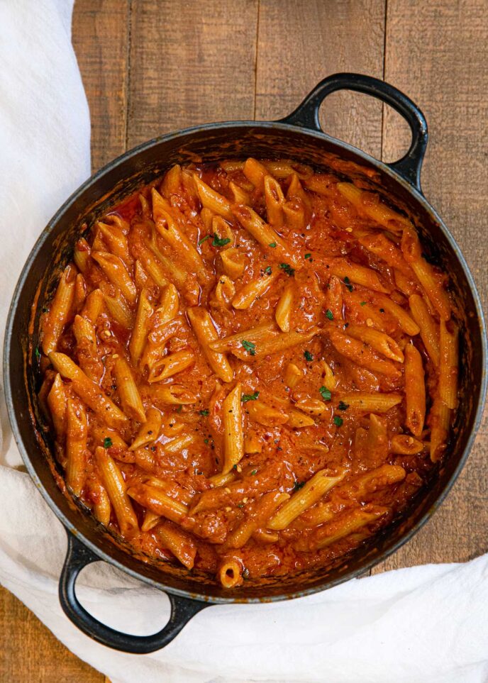 Vodka Sauce in black pot on wooden board