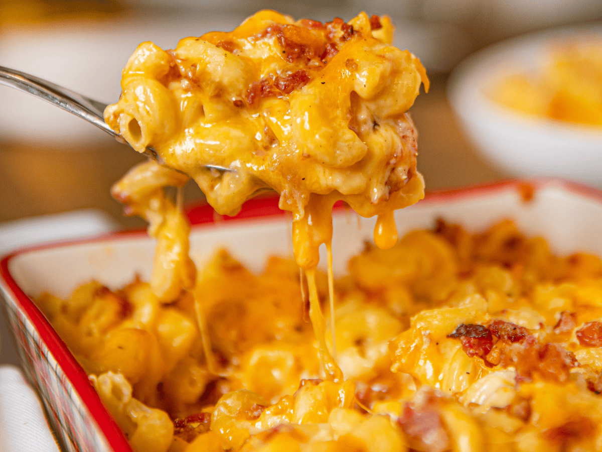 fork taking a bite of cheesy mac 