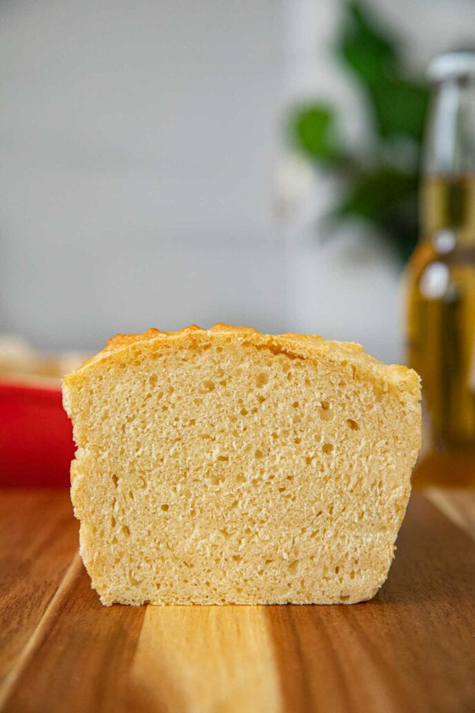 Beer Bread sliced loaf on cutting board