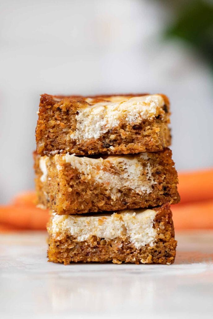 Carrot Cake Cheesecake Bars in stack