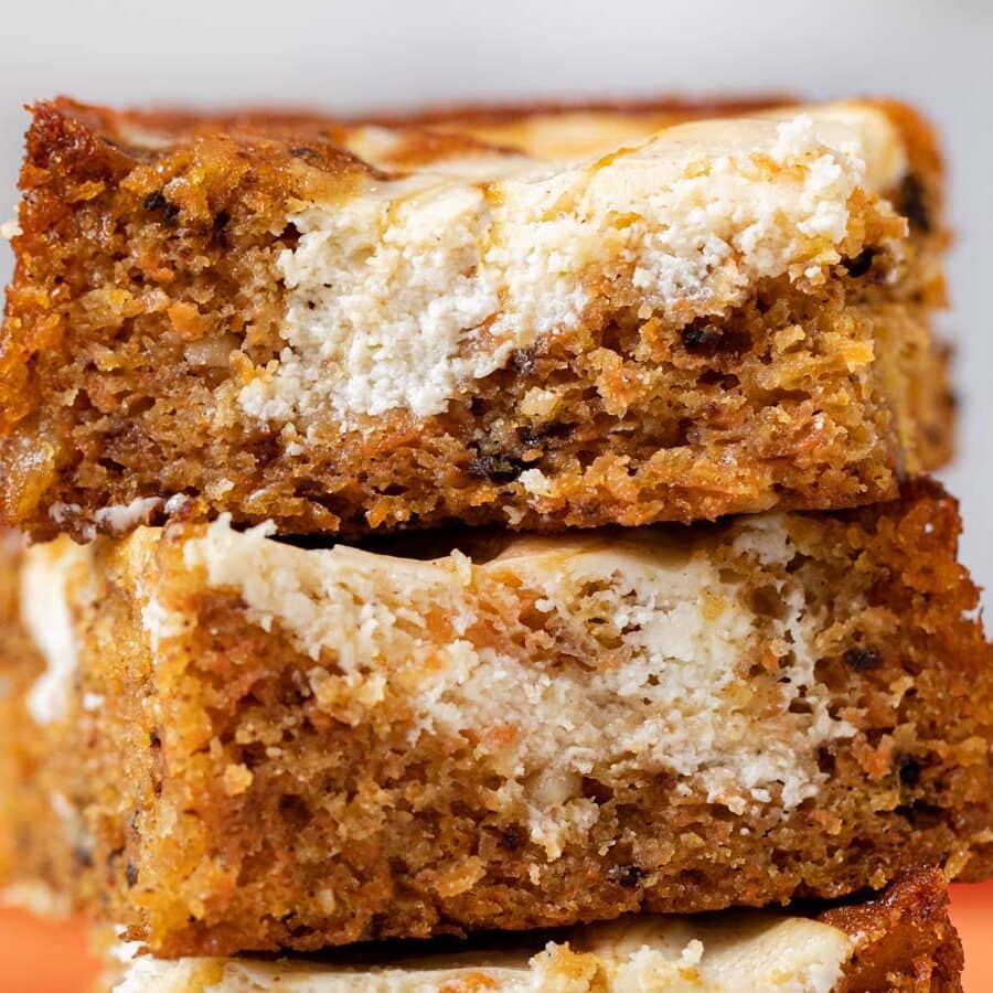 Carrot Cake Cheesecake Bars in stack