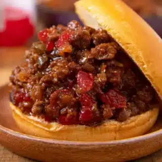 Meat mixture served on bun with bun open