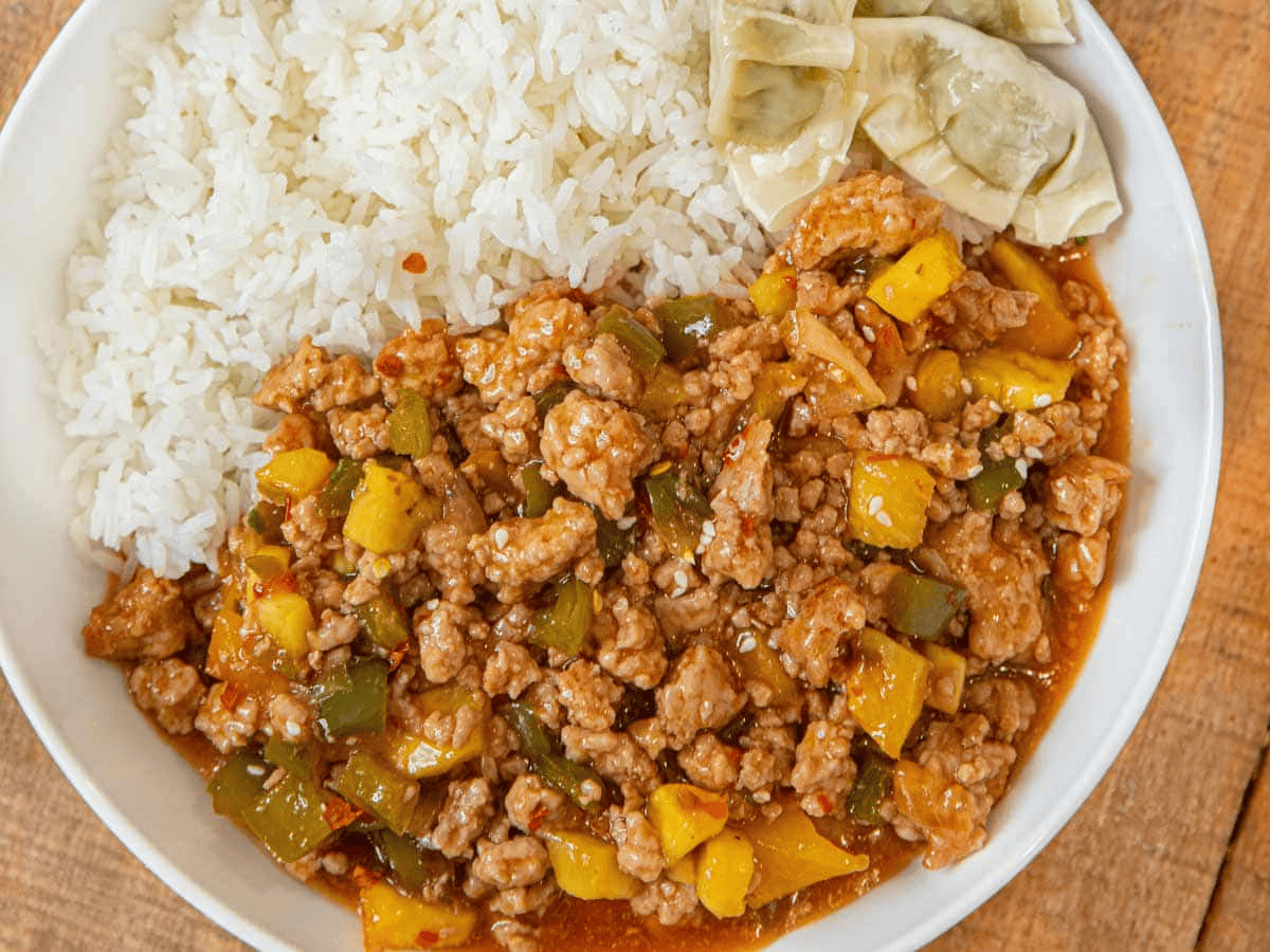 Chicken mixture in a bowl woth rice