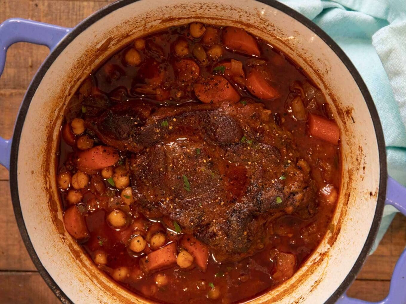 Chuck roast cooked in broth with veggies and chickpeas