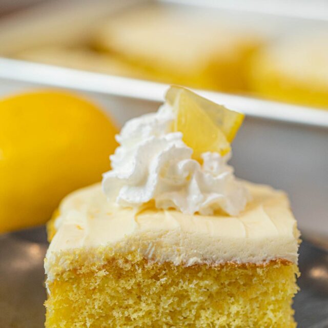 Lemon Sheet Cake slice on plate