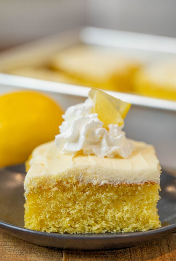 Lemon Sheet Cake slice on plate