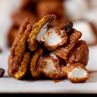 No-Bake S'mores Cookies with bite removed on parchment paper