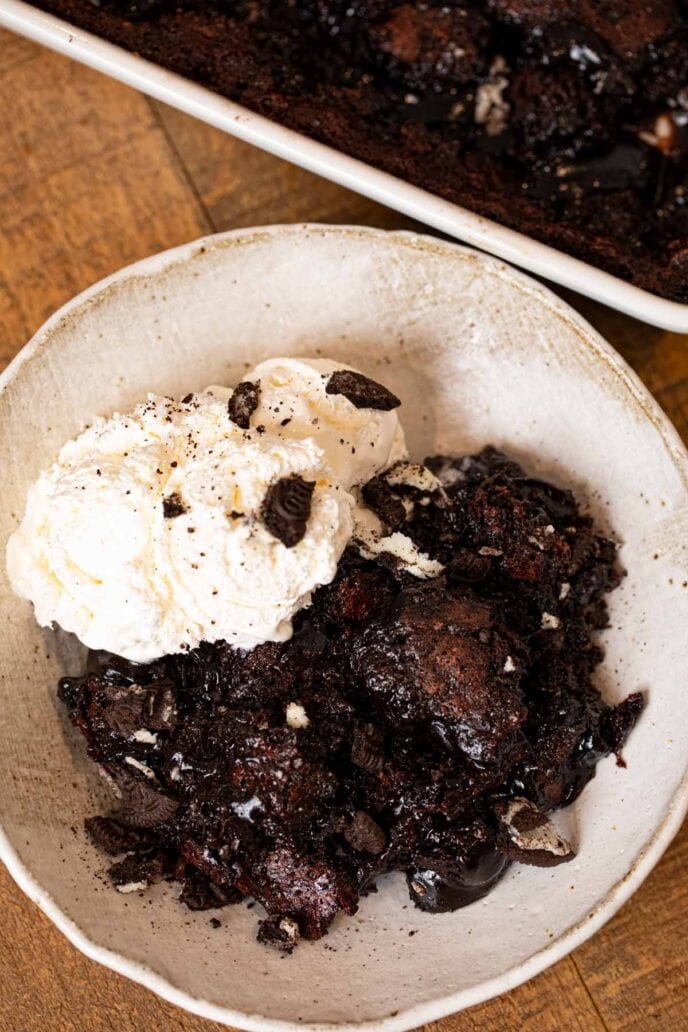 Oreo Cobbler in bowl with vanilla ice cream