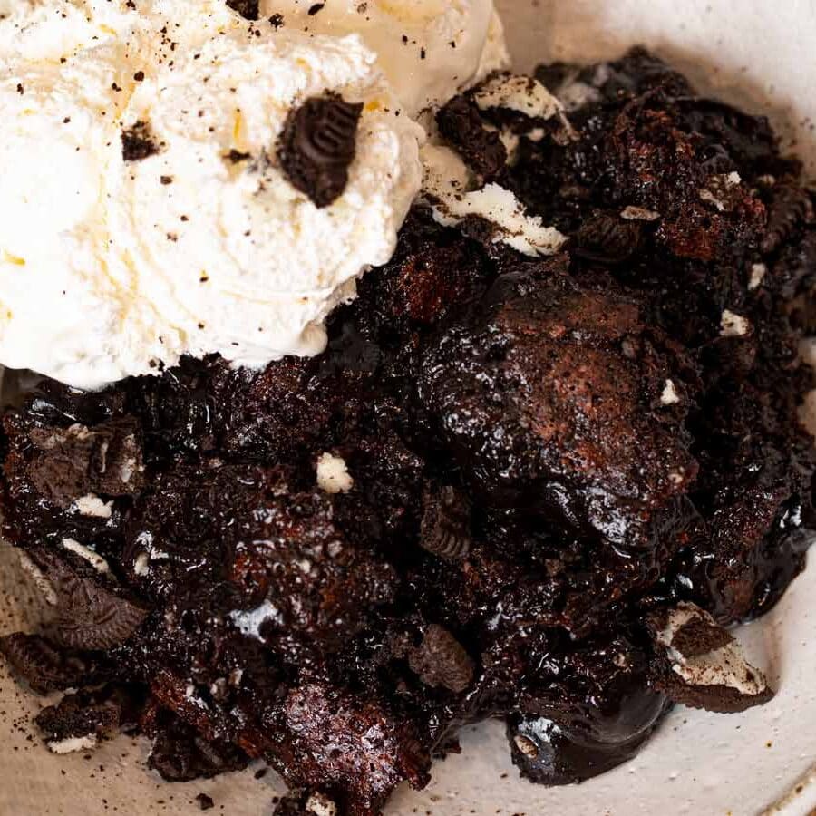 Oreo Cobbler in bowl with vanilla ice cream