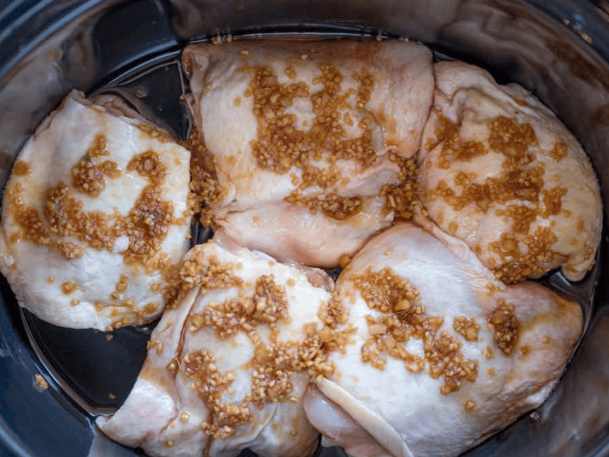 chicken in slow cooker before cooking 