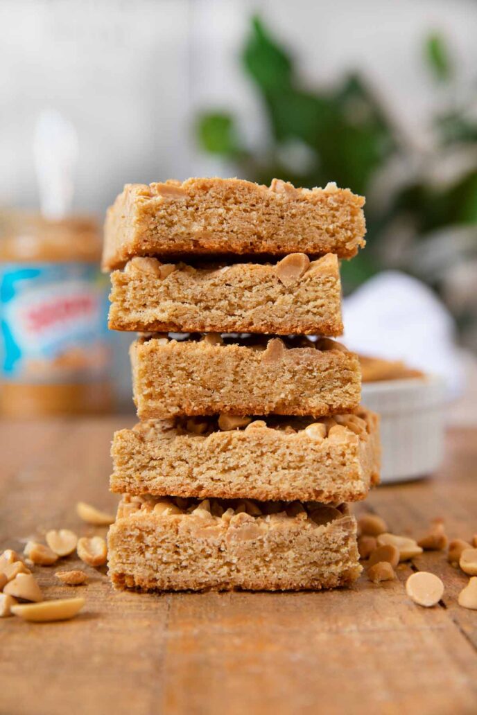 Ultimate Triple Peanut Blondies in stack