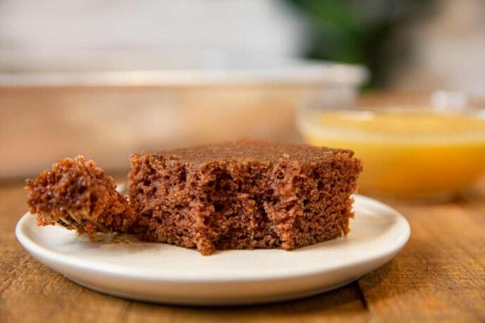 Applesauce Cake on plate with bite removed