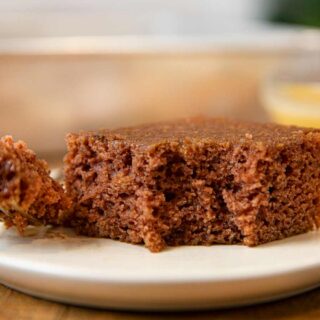 Applesauce Cake on plate with bite removed