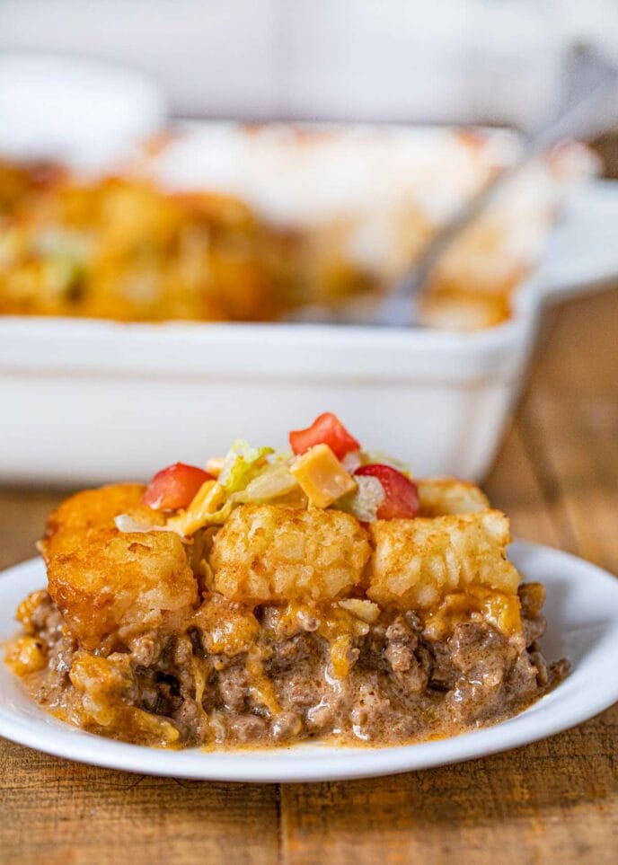 Square of Big Mac Tater Tot Casserole on white plate