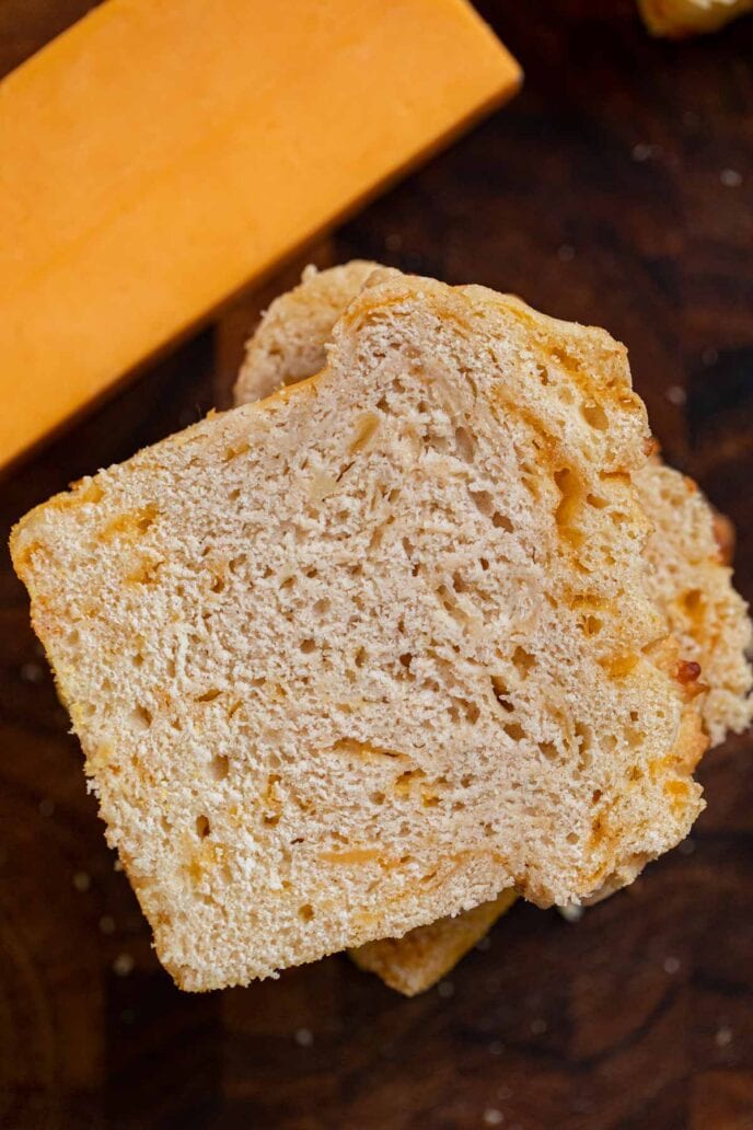 Cheddar Beer Bread slices in stack, top-down view