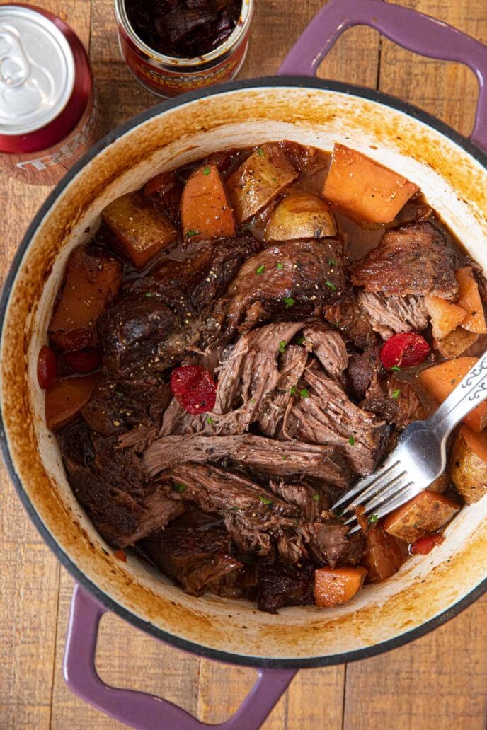 Dr. Pepper Pot Roast in pot, shredded