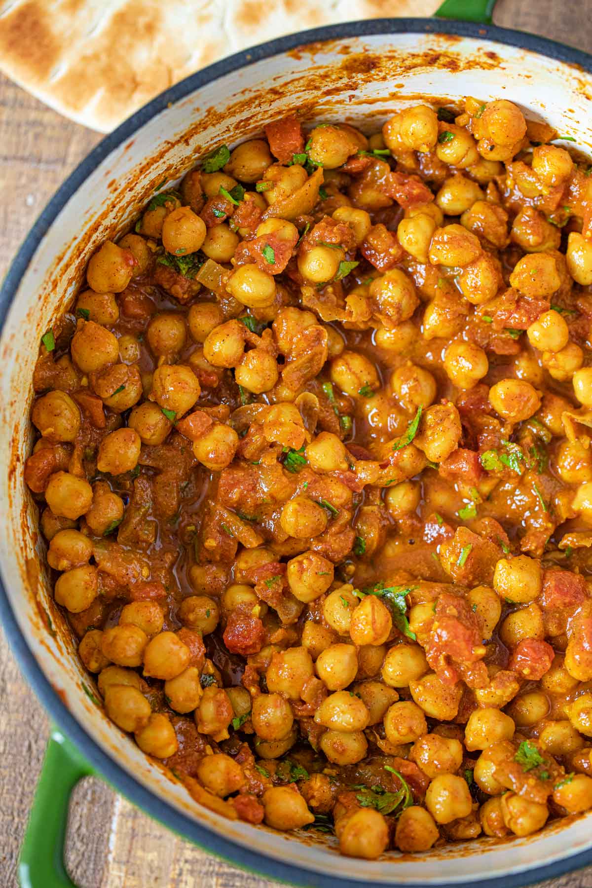 Indian Chickpea Chana Masala Curry in green pot