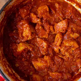 Indian Tomato Chicken in red pot