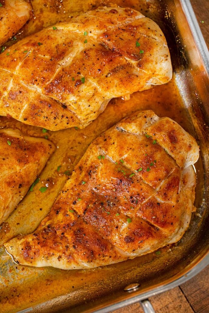 Oven Baked Rotisserie Chicken Breasts in roasting pan