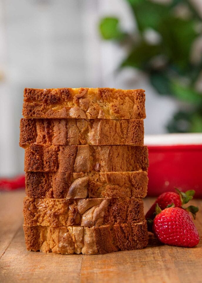 Strawberry Shortcake Loaf in a stack next to strawberries