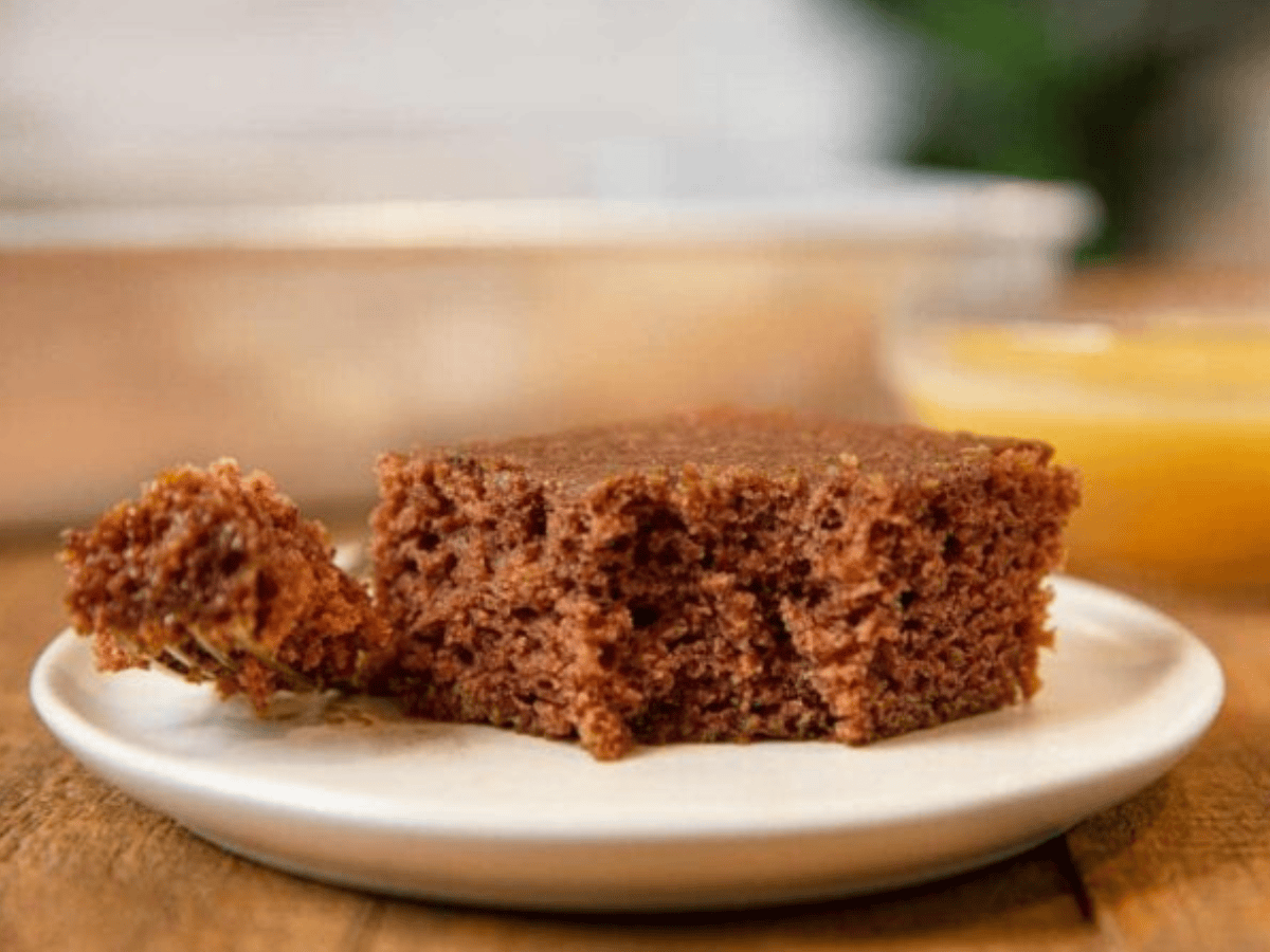 Cake served on white plate with bite taken out