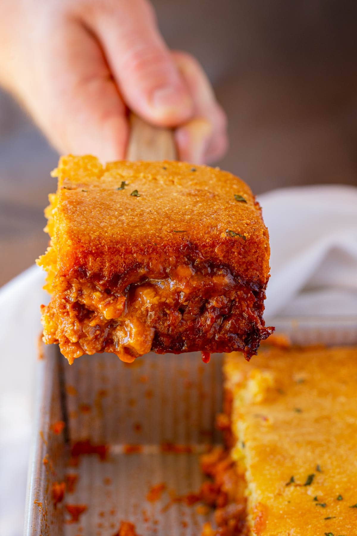 BBQ Chicken Cornbread Casserole serving on spatula