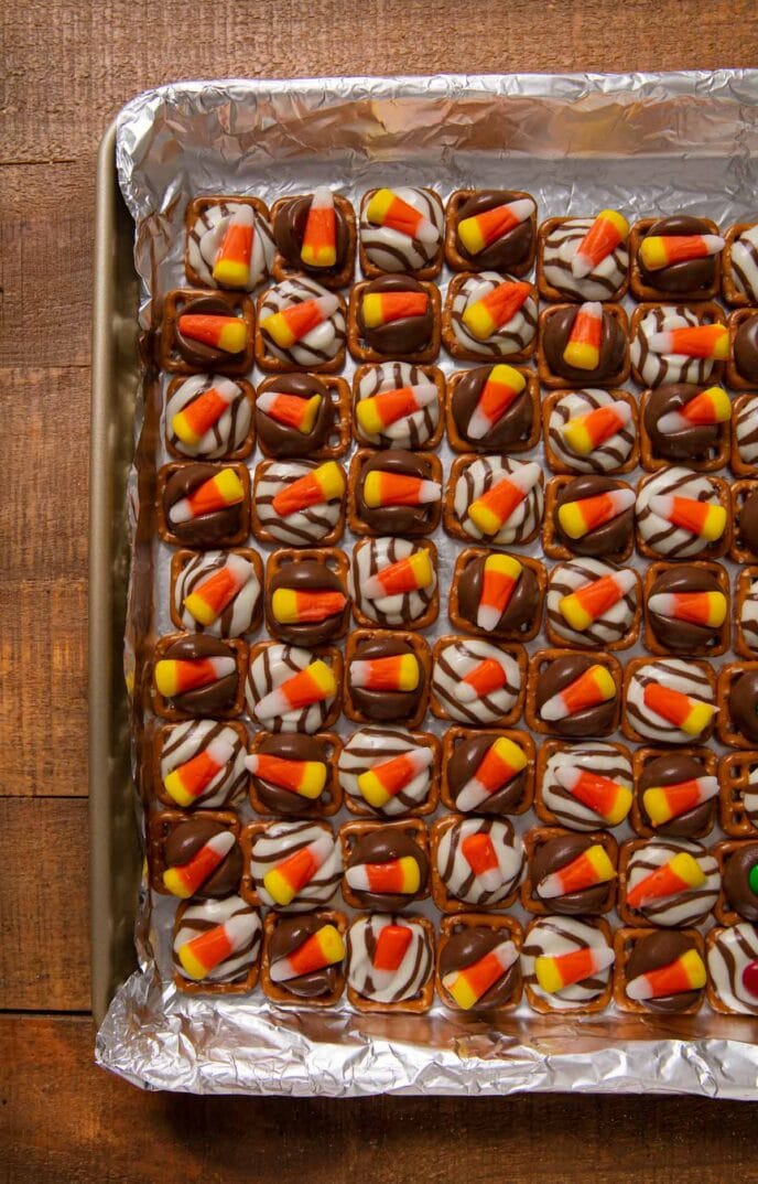 Candy Corn Pretzel Hugs on baking sheet