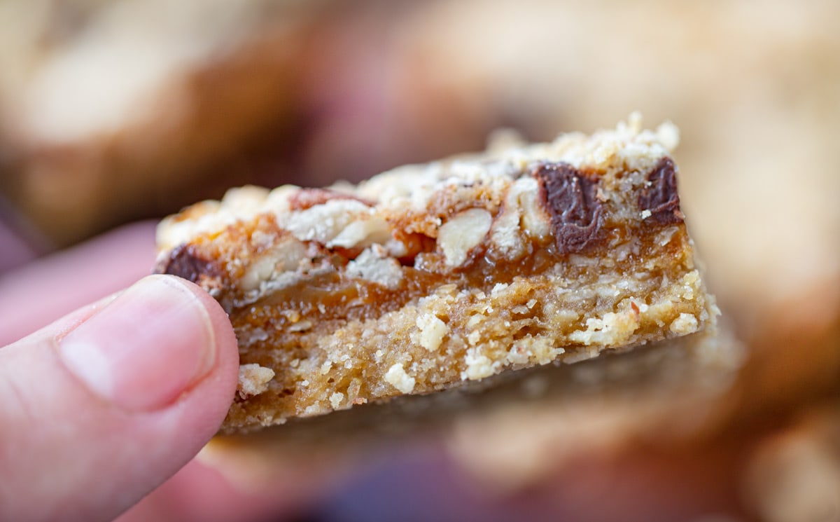 holding a slice of Caramelitas