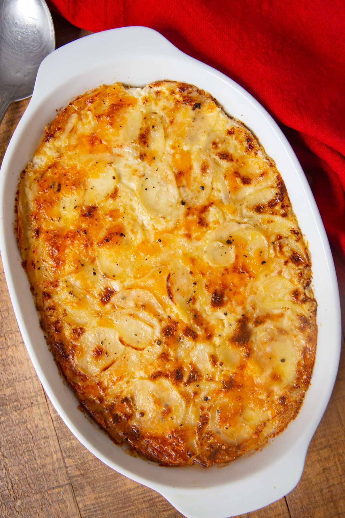 Cheesy Garlic Scalloped Potatoes in baking dish