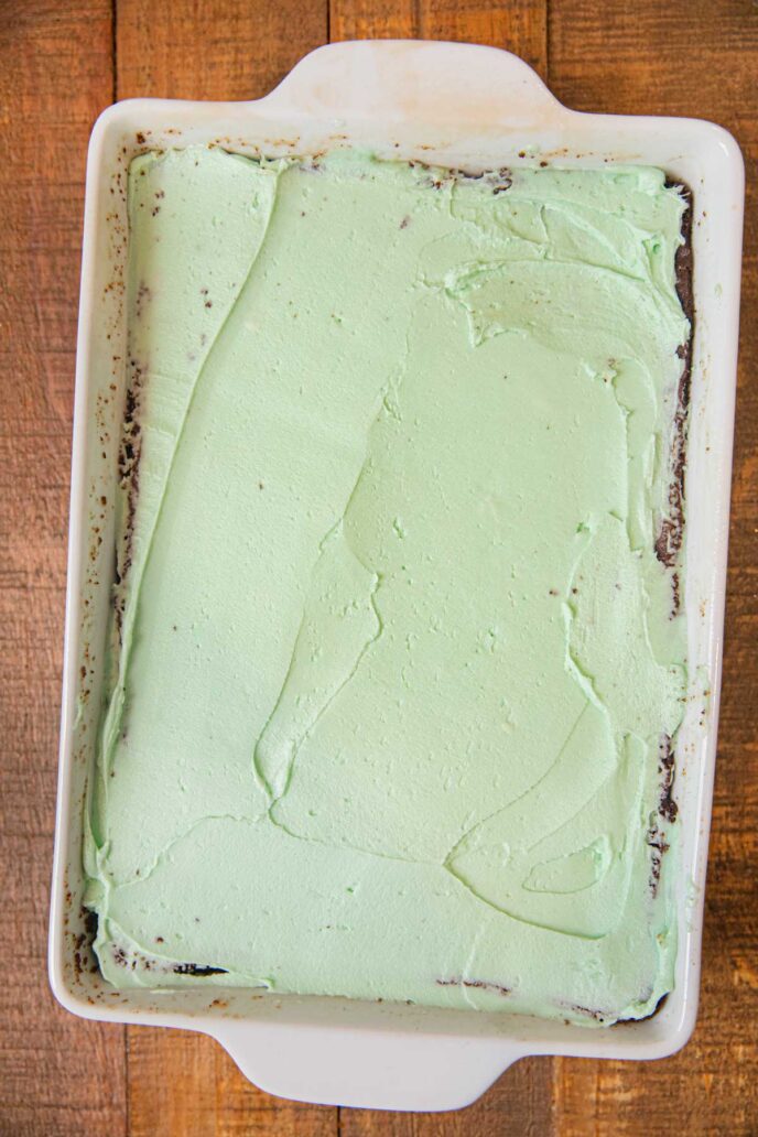 Chocolate Mint Brownies in baking dish with mint cream layer