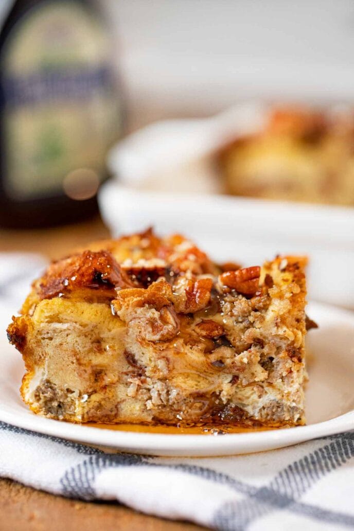 Cinnamon Raisin Sausage Breakfast Bake serving on plate with maple syrup