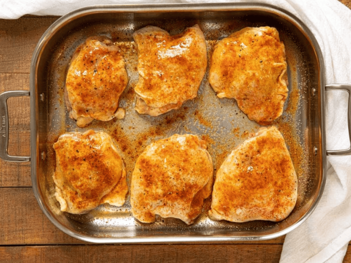Chicken thighs in baking pan ready to cook