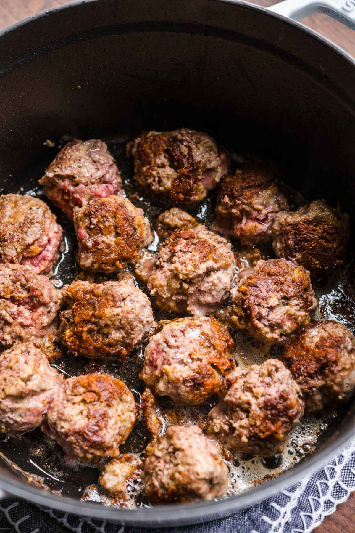 Italian Wedding Soup meatballs browning in pot