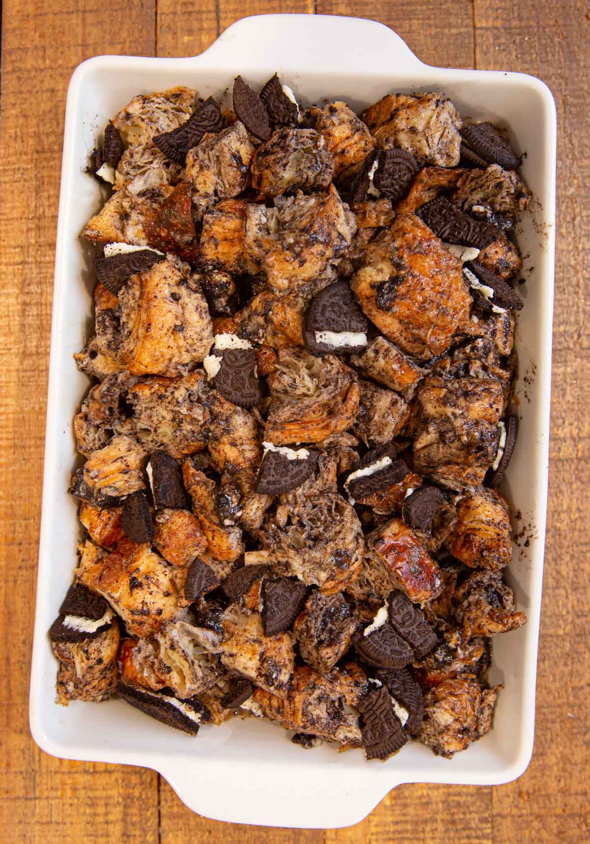 Top down of Oreo Croissant Bread Pudding in baking dish before baking