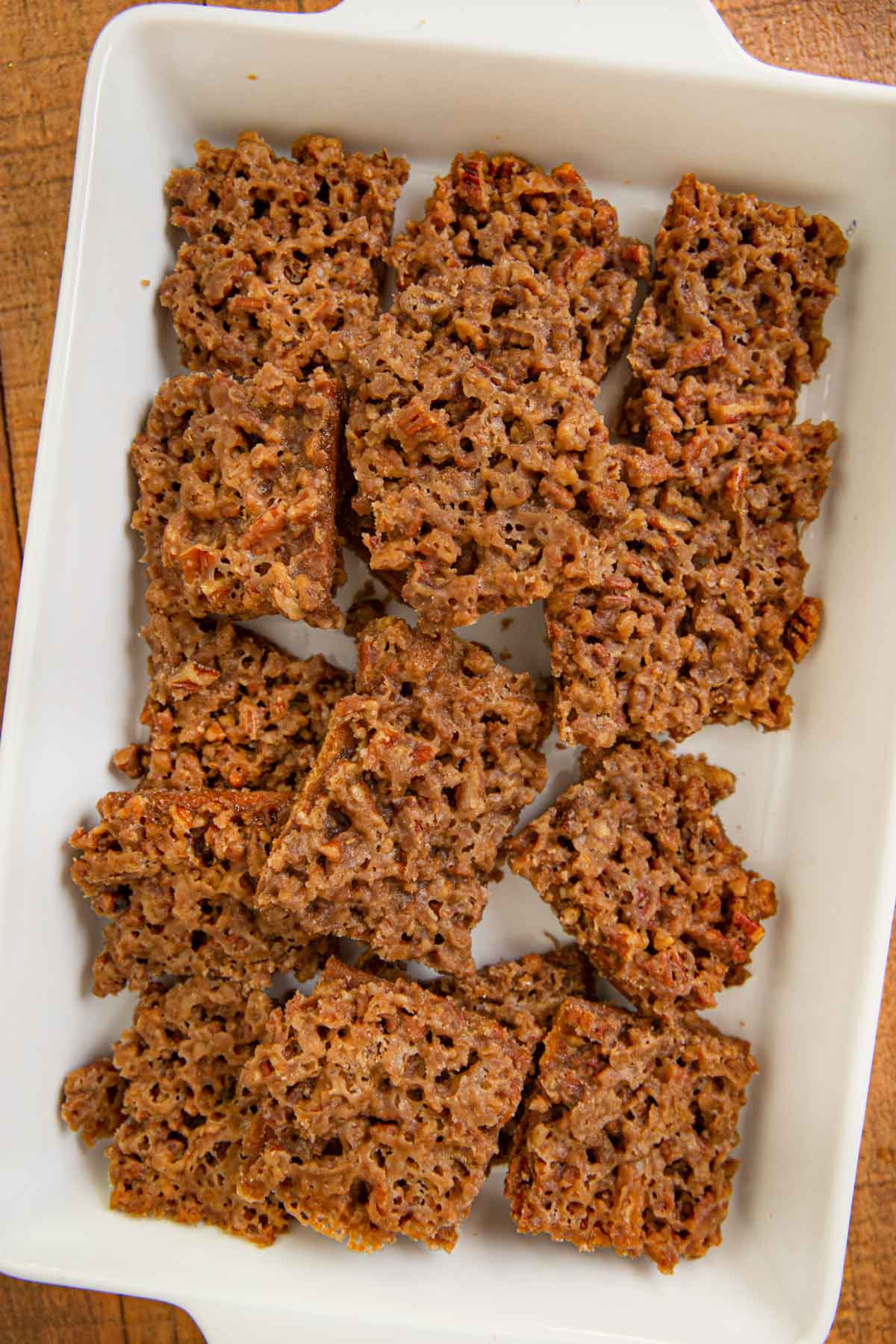 Pecan Pie Bark broken apart in baking dish