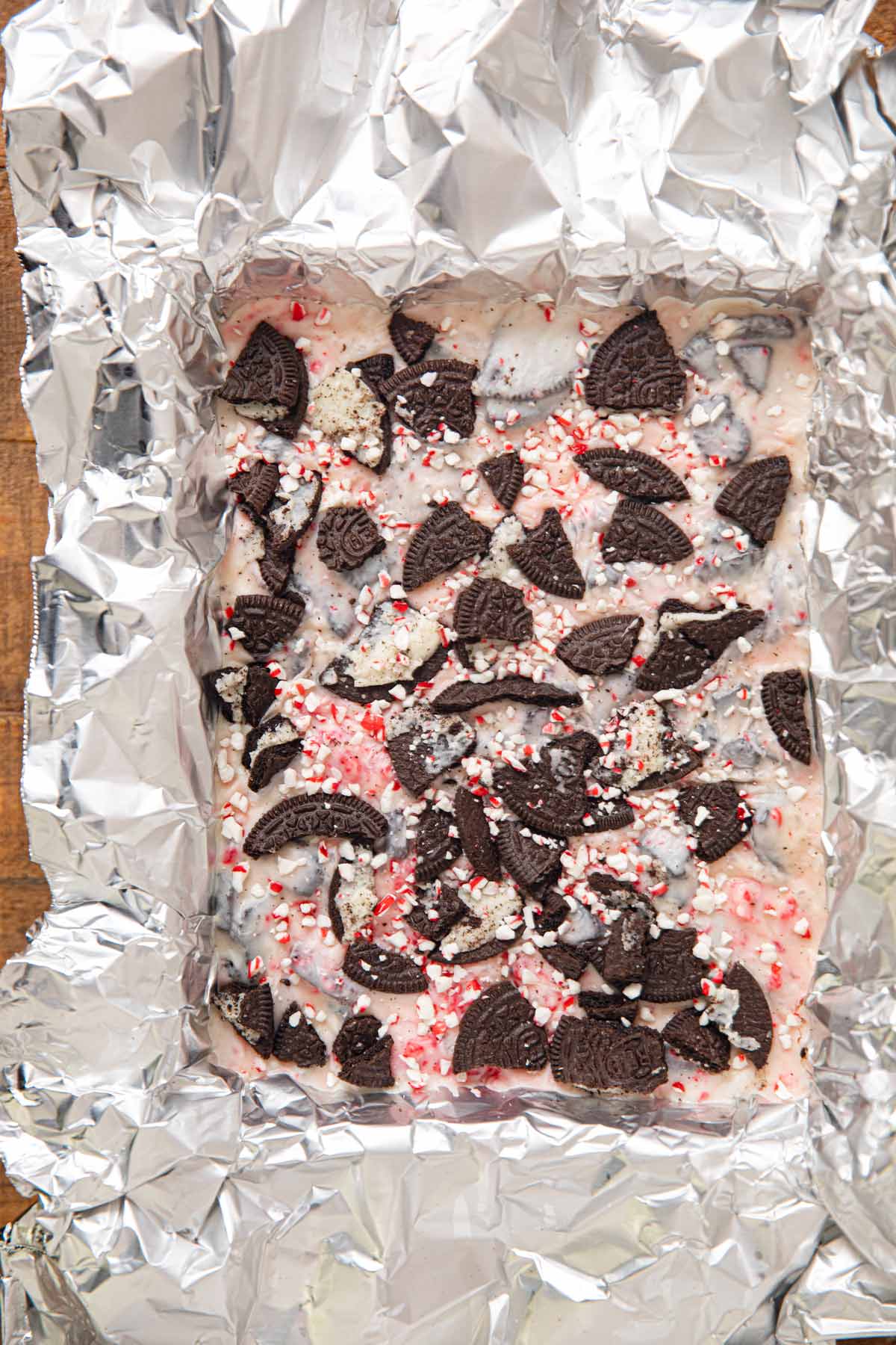 Peppermint Oreo Fudge in pan lined with foil
