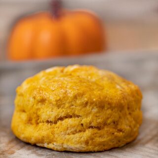Pumpkin Biscuits with small pumpkin in the background